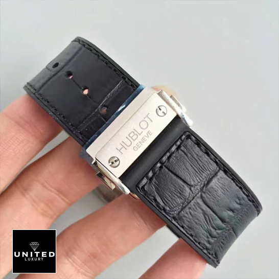 Hublot Geneve Classic Fusion Leather Black Bracelet Replica on the hand grey background