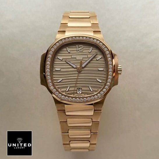 Patel Philippe Geneve Gold Diamond Bezel Replica front view rose gold background